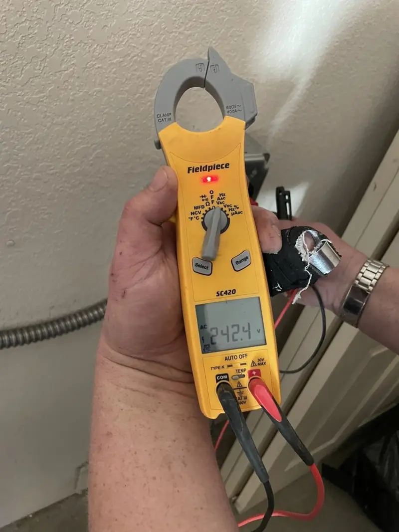 Voltage testing with clamp meter during Circuit Breaker Repair in Kernersville